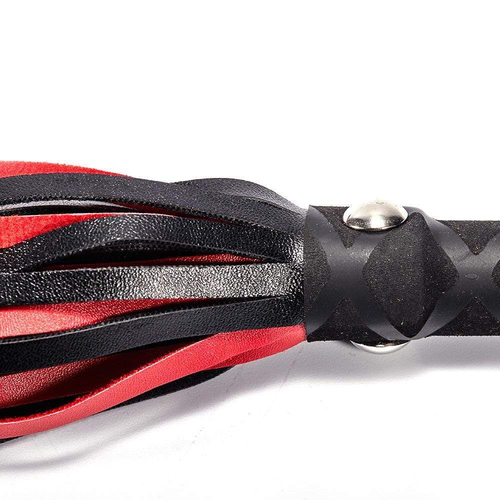 Fouet à fesser noir et rouge pour le flirt